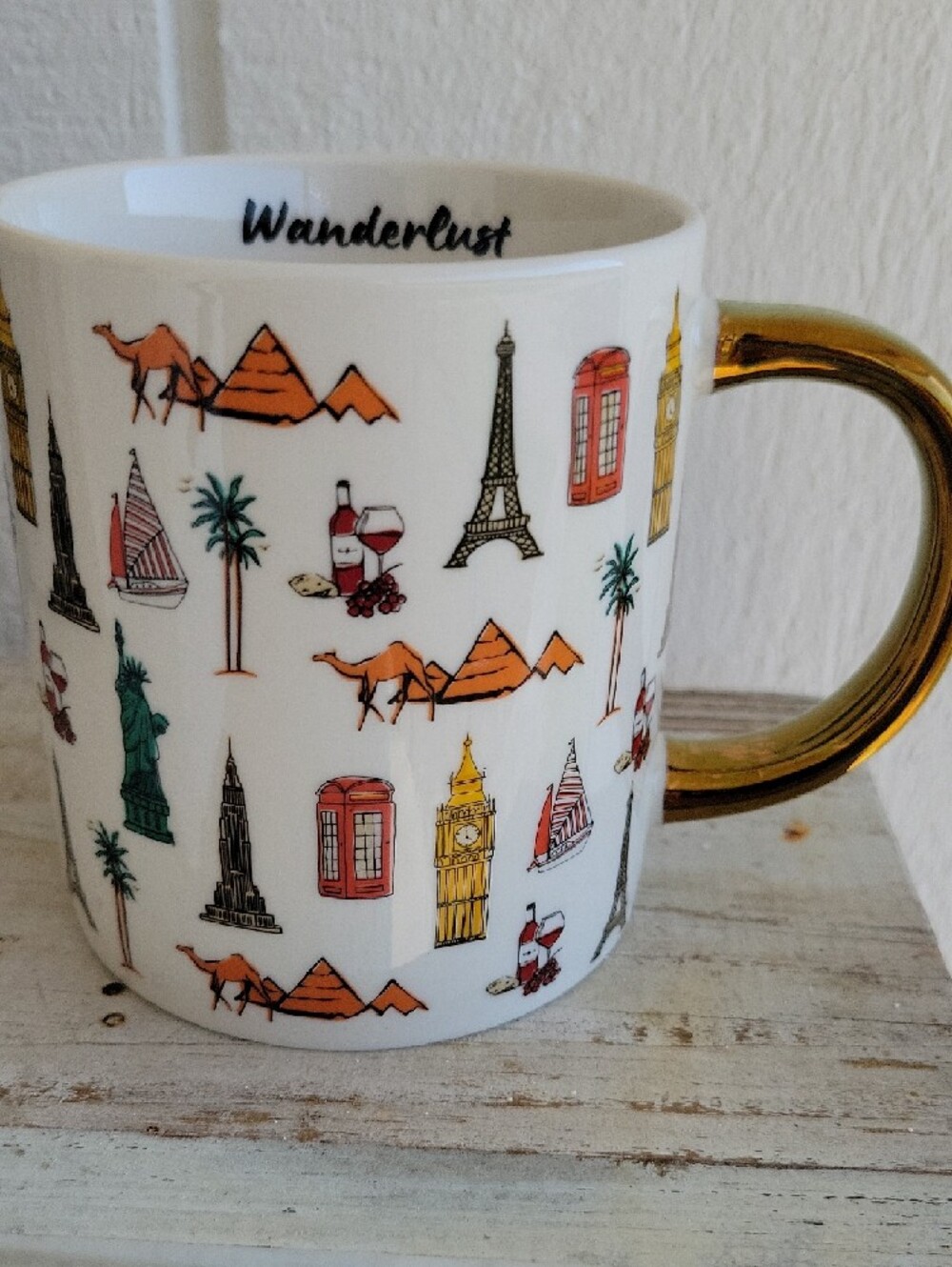 Wanderlust White Stoneware Mug with Gold Handle and Multicolor Travel Icons - Picture 5 of 8